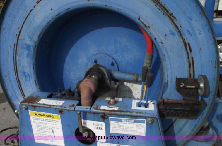 image for item 5595 2000 International Series 2554 Vac-Con truck