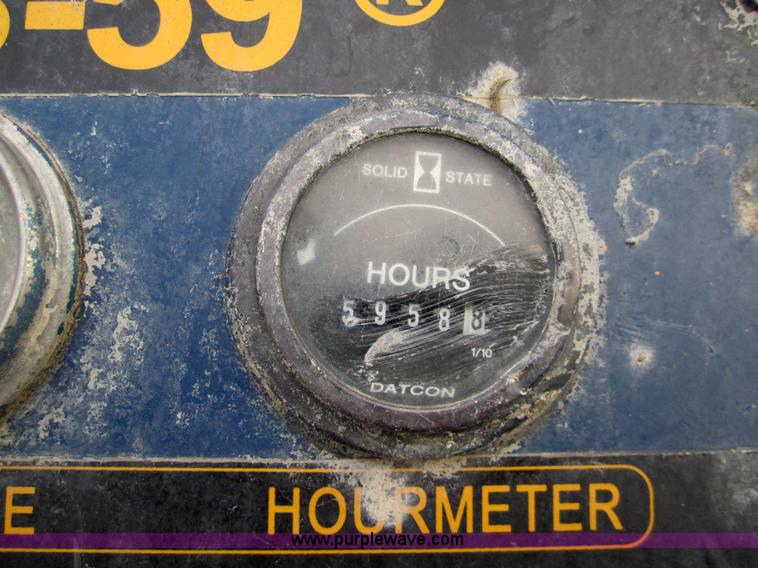 image for item 7522 1995 Ford FT900F truck with mobile drill