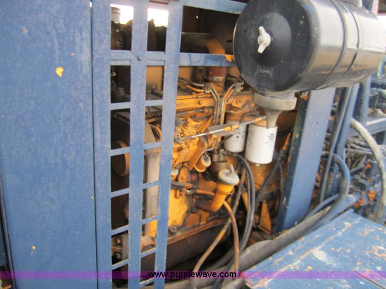 image for item 7522 1995 Ford FT900F truck with mobile drill