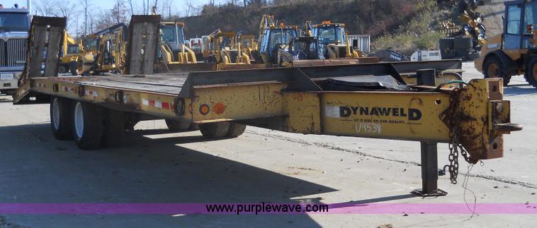 image for item 7768 1998 Dynaweld 30' flatbed trailer with dove-tail ramps