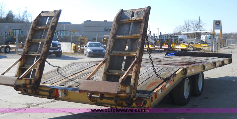 image for item 7768 1998 Dynaweld 30' flatbed trailer with dove-tail ramps