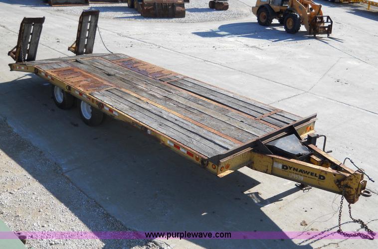 image for item 7768 1998 Dynaweld 30' flatbed trailer with dove-tail ramps