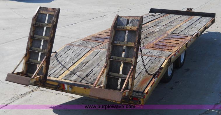 image for item 7768 1998 Dynaweld 30' flatbed trailer with dove-tail ramps