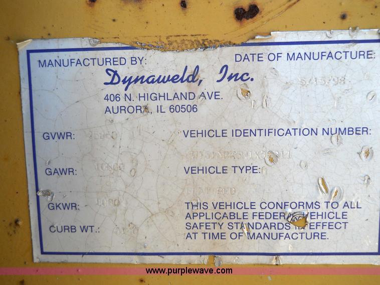 image for item 7768 1998 Dynaweld 30' flatbed trailer with dove-tail ramps