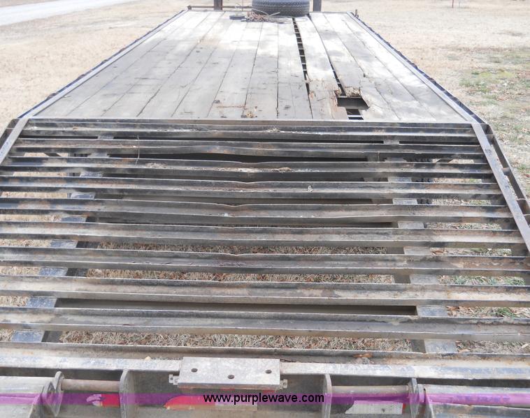 image for item 7770 1997 R&W gooseneck flatbed trailer