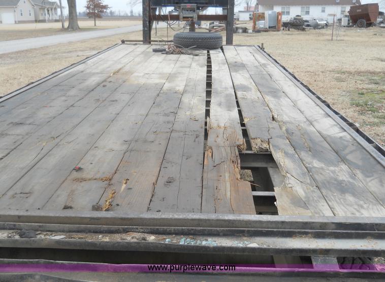 image for item 7770 1997 R&W gooseneck flatbed trailer