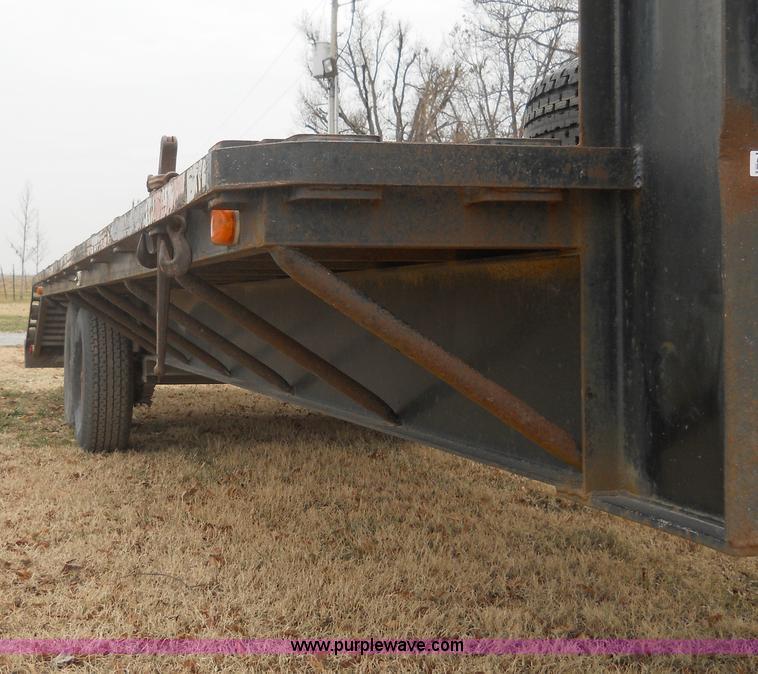 image for item 7770 1997 R&W gooseneck flatbed trailer