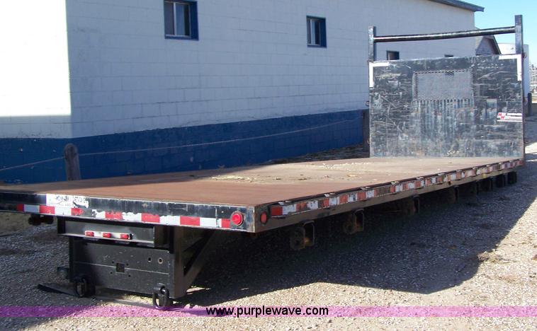 image for item 7498 2004 heavy duty truck flat bed