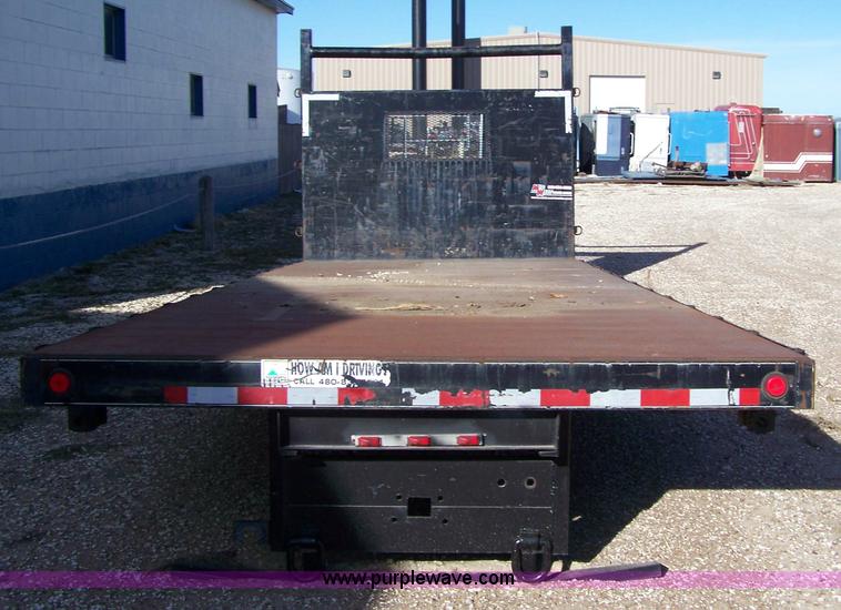 image for item 7498 2004 heavy duty truck flat bed