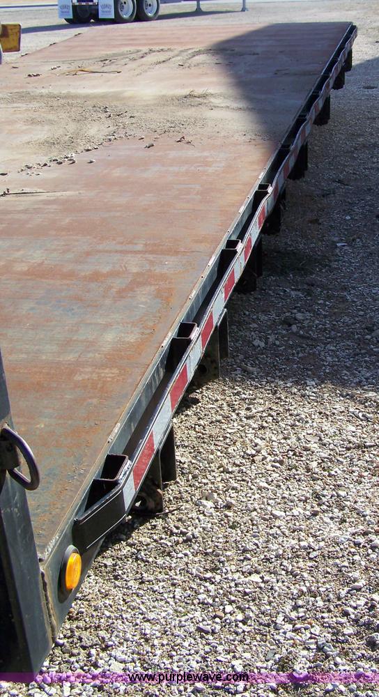 image for item 7498 2004 heavy duty truck flat bed