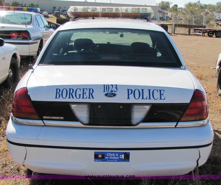 image for item 8307 1999 Ford Crown Victoria Police Interceptor