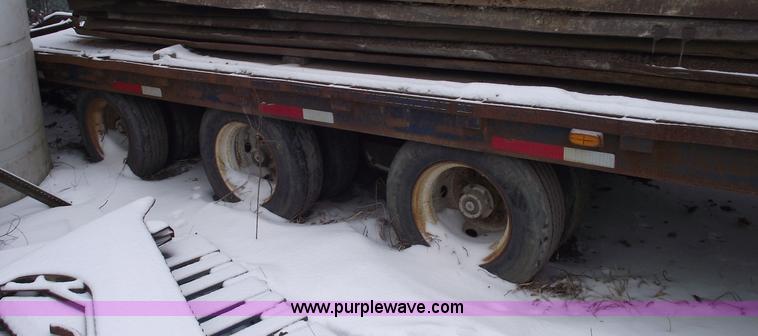 image for item 5457 1997 Overbuilt 20 ton triple axle tilt trailer