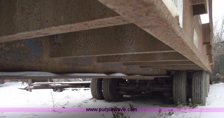 image for item 5457 1997 Overbuilt 20 ton triple axle tilt trailer