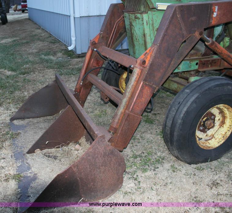 image for item 6799 John Deere 4020 tractor and loader