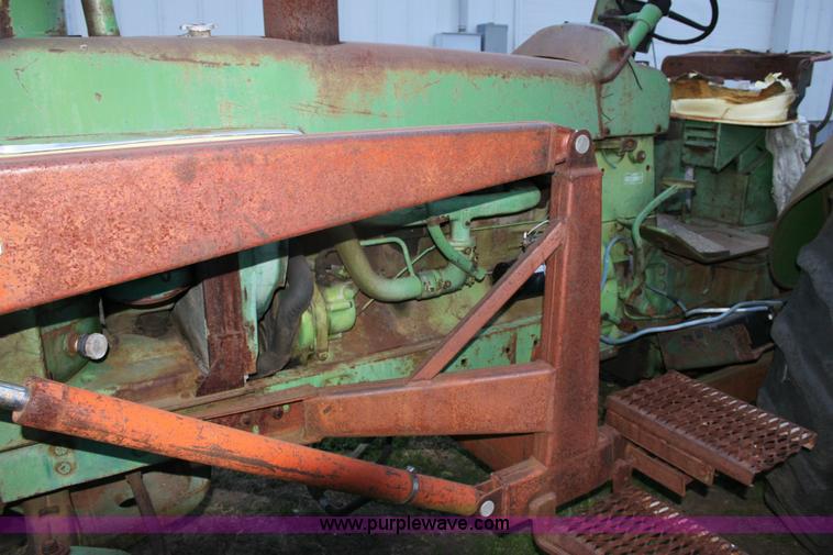 image for item 6799 John Deere 4020 tractor and loader