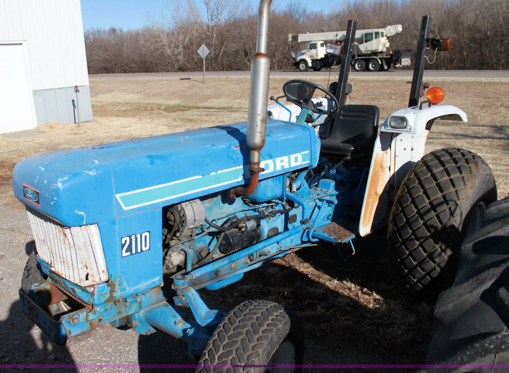 Ford 2110 tractor and finish mower in Winfield, KS Item 6800 sold