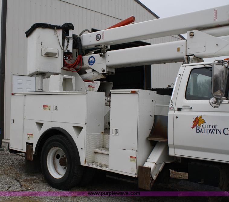 image for item 4920 Knapheide 6137HBA2 utility bed with Holan bucket boom