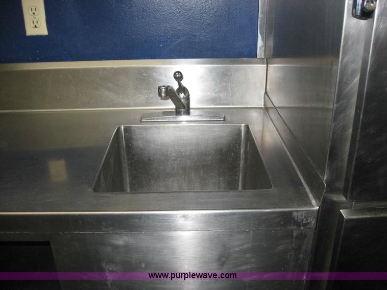 image for item 5169 Stainless steel sink with storage cabinet