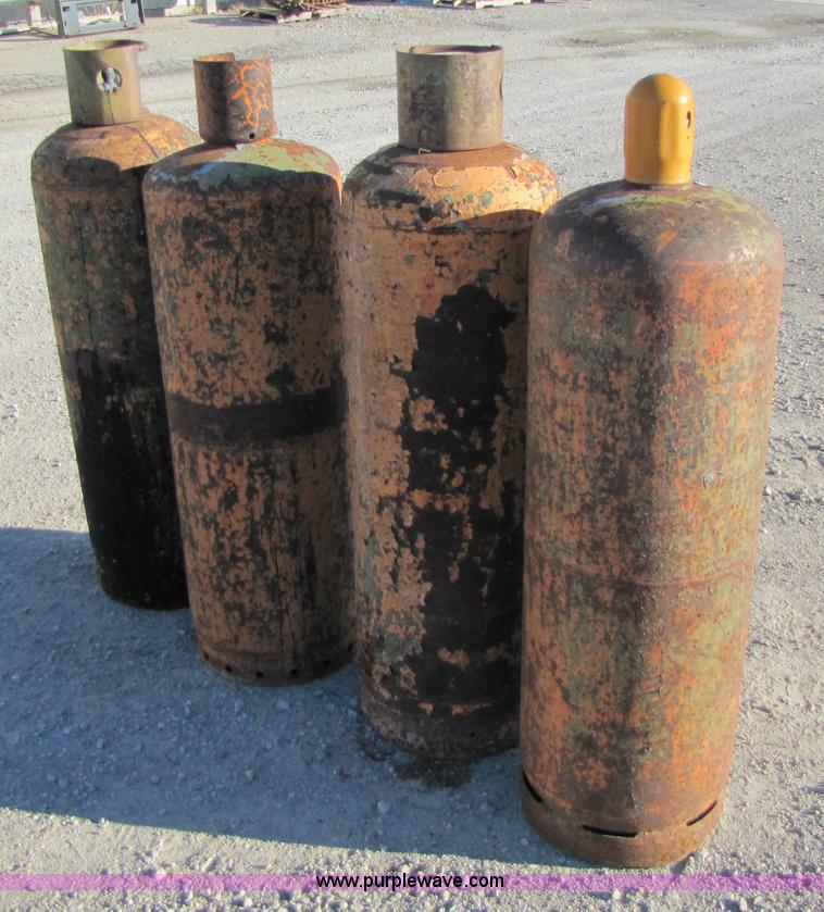 image for item 5208 (4) propane cylinders
