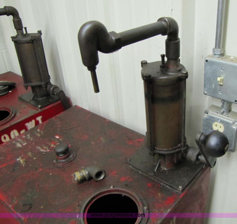 image for item 5233 (3) liquid storage tanks with hand pumps