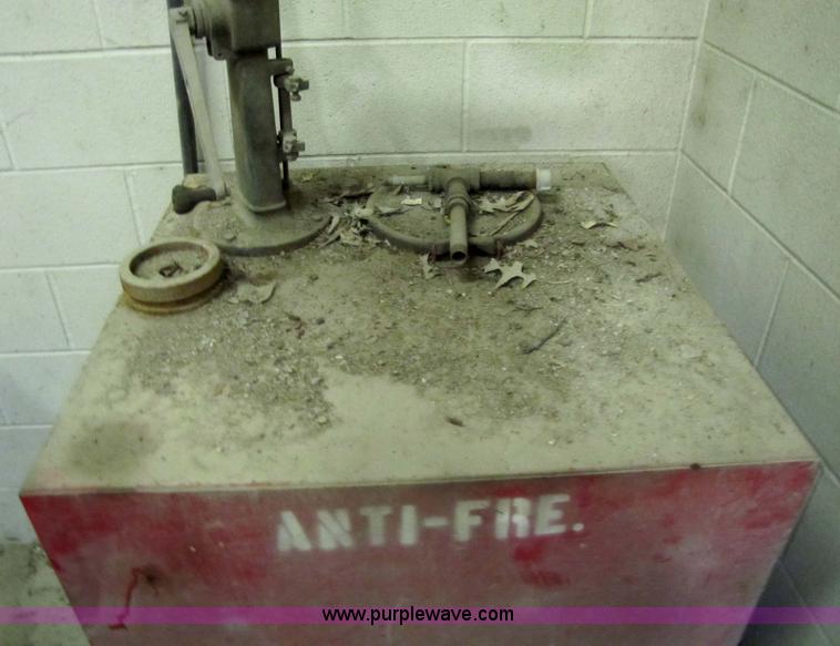 image for item 5233 (3) liquid storage tanks with hand pumps