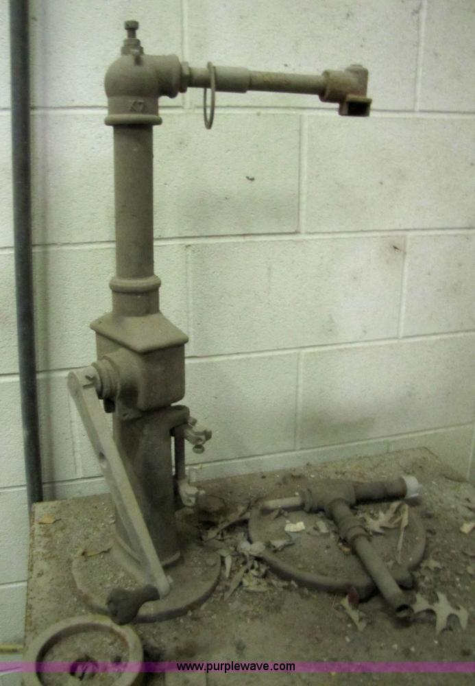 image for item 5233 (3) liquid storage tanks with hand pumps