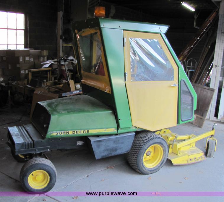 image for item 5235 1994 John Deere F925 front mount mower with broom
