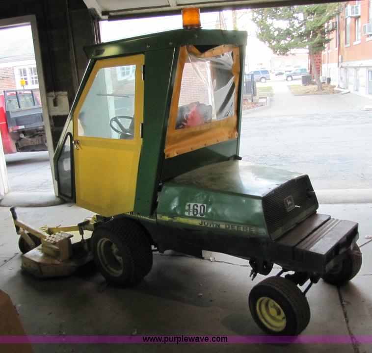 image for item 5235 1994 John Deere F925 front mount mower with broom