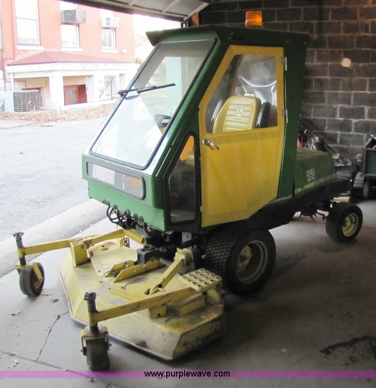 image for item 5235 1994 John Deere F925 front mount mower with broom