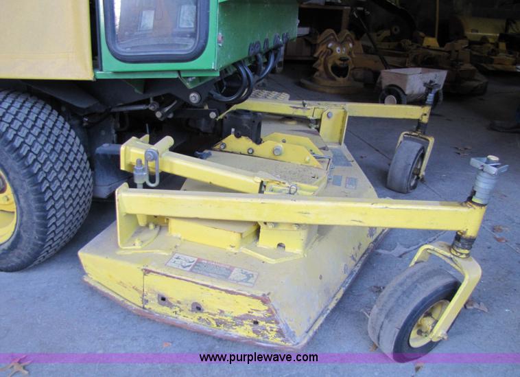 image for item 5235 1994 John Deere F925 front mount mower with broom