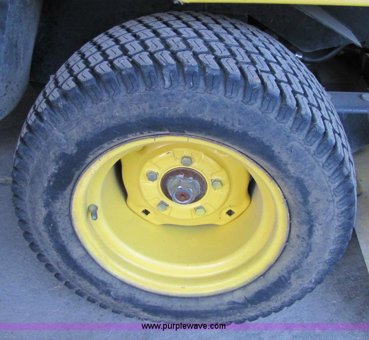 image for item 5235 1994 John Deere F925 front mount mower with broom