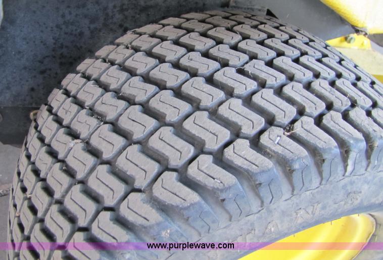 image for item 5235 1994 John Deere F925 front mount mower with broom