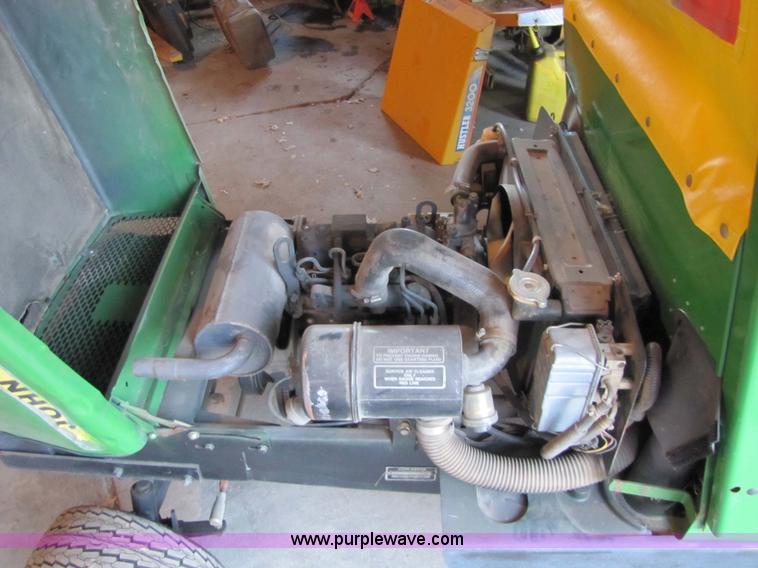 image for item 5235 1994 John Deere F925 front mount mower with broom