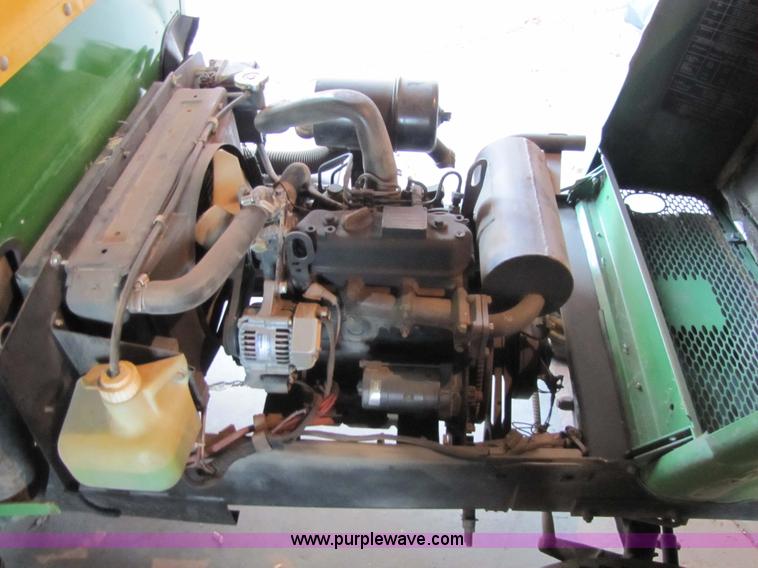 image for item 5235 1994 John Deere F925 front mount mower with broom