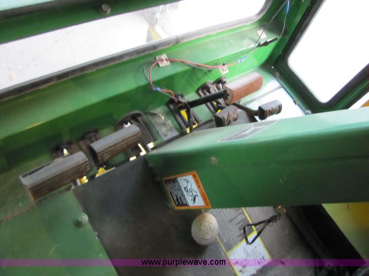 image for item 5235 1994 John Deere F925 front mount mower with broom