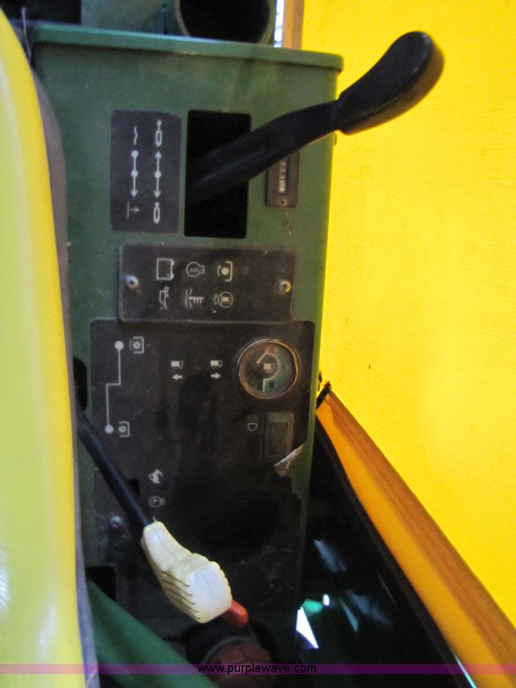 image for item 5235 1994 John Deere F925 front mount mower with broom