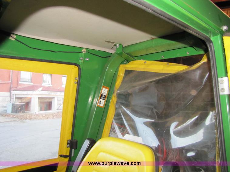 image for item 5235 1994 John Deere F925 front mount mower with broom