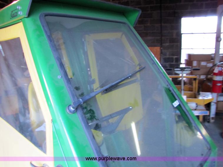 image for item 5235 1994 John Deere F925 front mount mower with broom