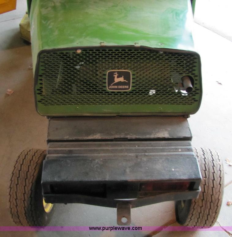 image for item 5235 1994 John Deere F925 front mount mower with broom