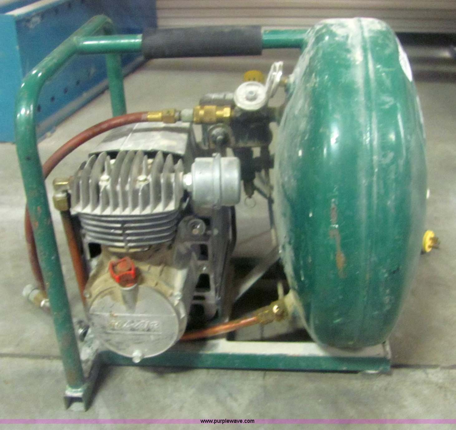 RoyAir air compressor in Wichita, KS Item 6102 sold Purple Wave