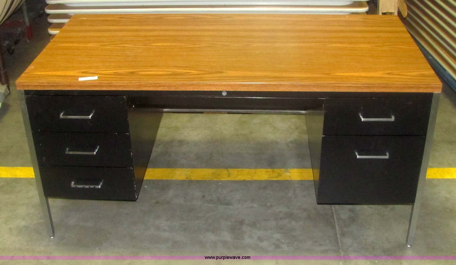 (9) five drawer office desks in Wichita, KS Item 6117 sold Purple Wave