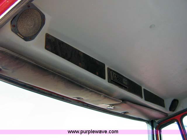 image for item 1502 2001 Freightliner FL70 conventional cab truck