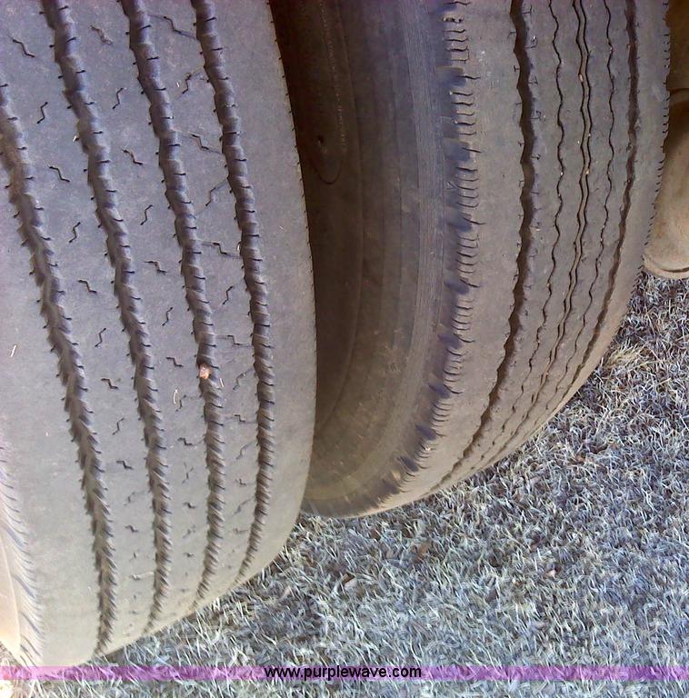 image for item 1610 1973 GMC 9500TS tandem axle grain truck