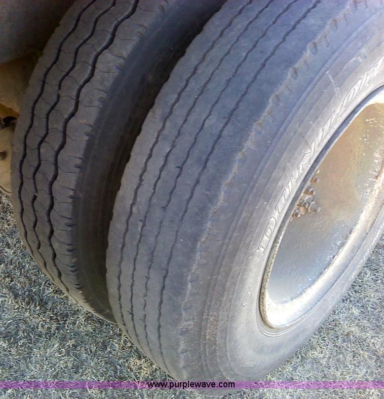 image for item 1610 1973 GMC 9500TS tandem axle grain truck