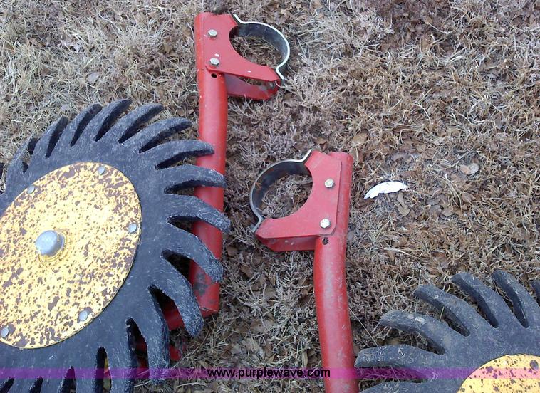 image for item 1701 Gathering wheels from New Holland BR780 round baler