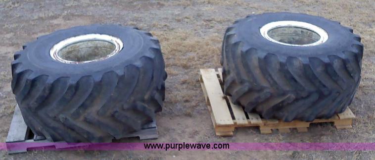 image for item 1828 (2) Goodyear 48x25.00-20NHS Terra tires and rims