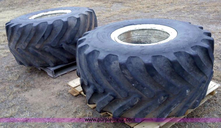 image for item 1828 (2) Goodyear 48x25.00-20NHS Terra tires and rims