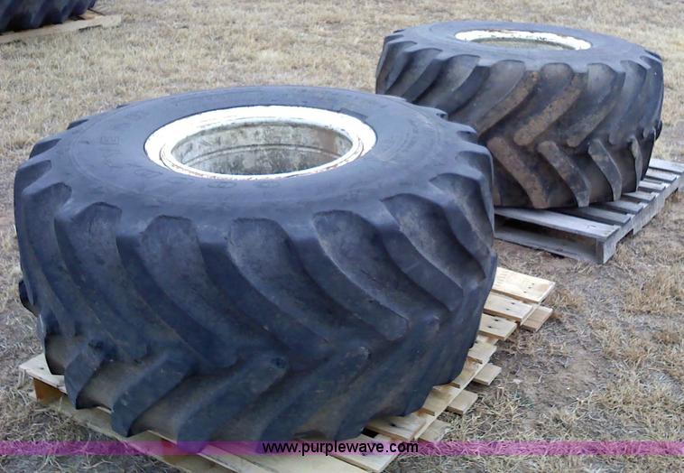 image for item 1828 (2) Goodyear 48x25.00-20NHS Terra tires and rims
