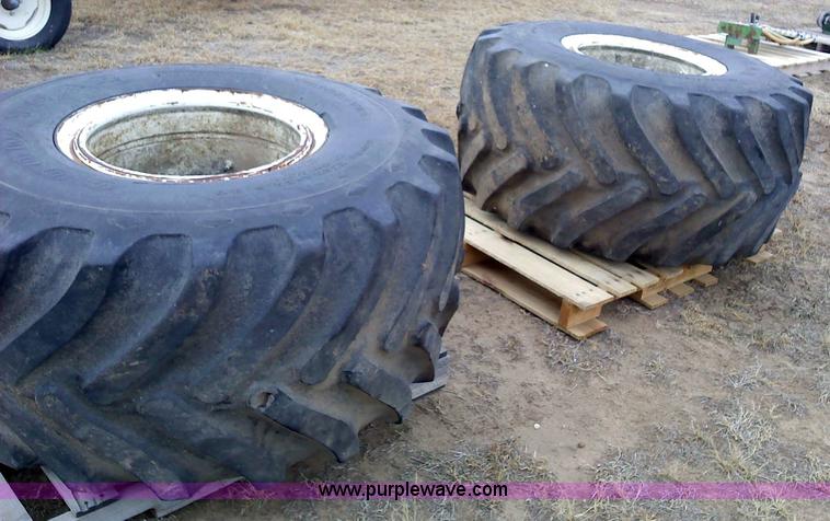 image for item 1828 (2) Goodyear 48x25.00-20NHS Terra tires and rims
