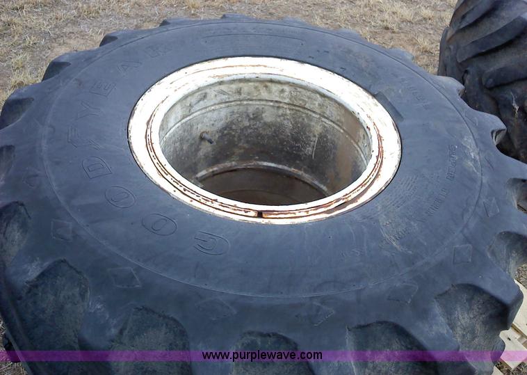 image for item 1828 (2) Goodyear 48x25.00-20NHS Terra tires and rims